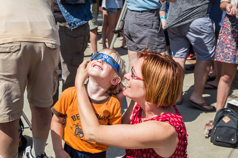 Mother and child at the Solar Eclipse on Campus
