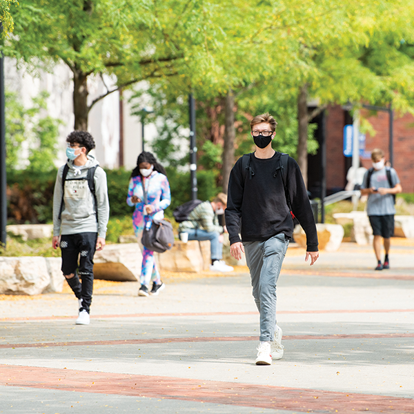 masked students on campus