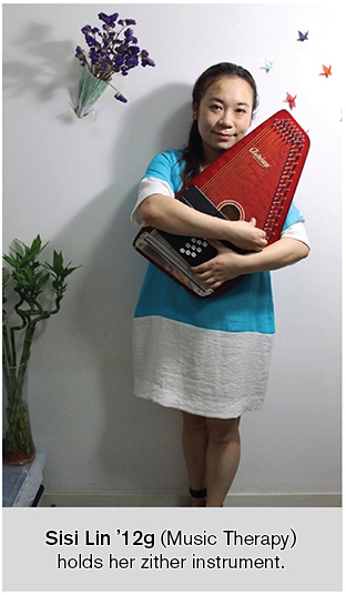 Sisi Lin holds her autoharp