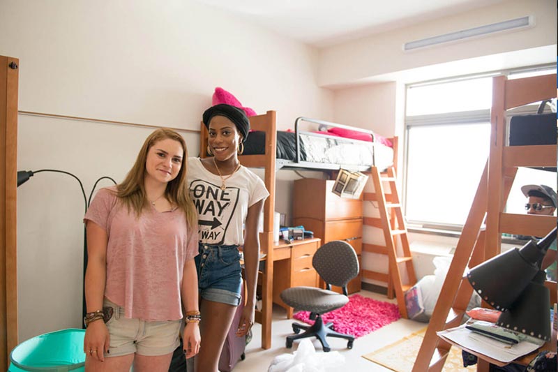 College Students Posing In Dormitory