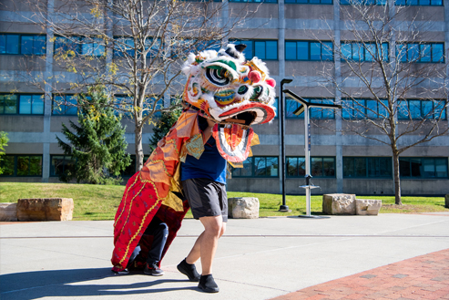 Student with a paper fan