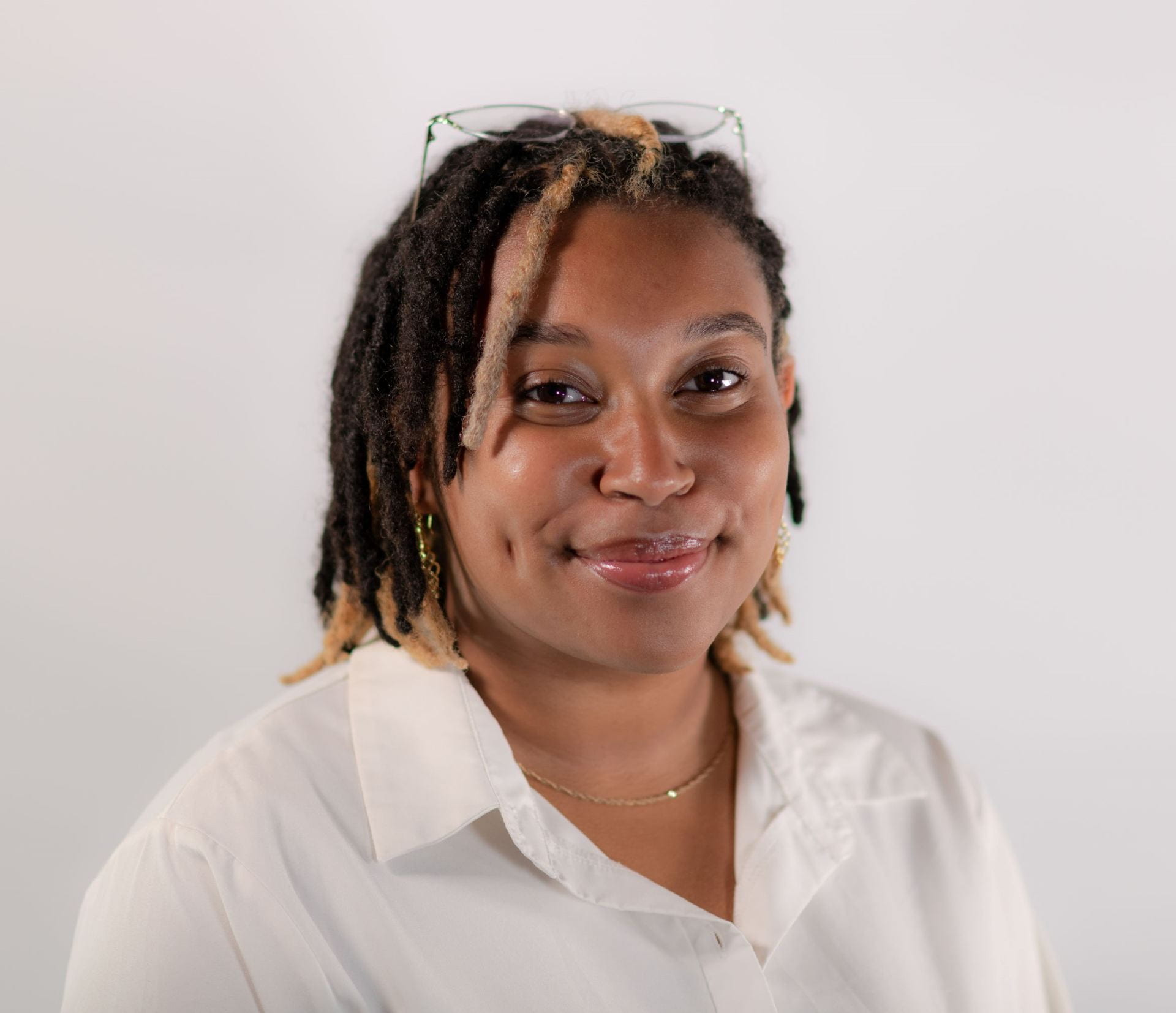 young black person in white shirt