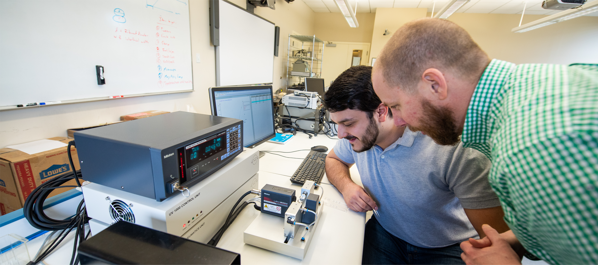 professor and student working in a lab