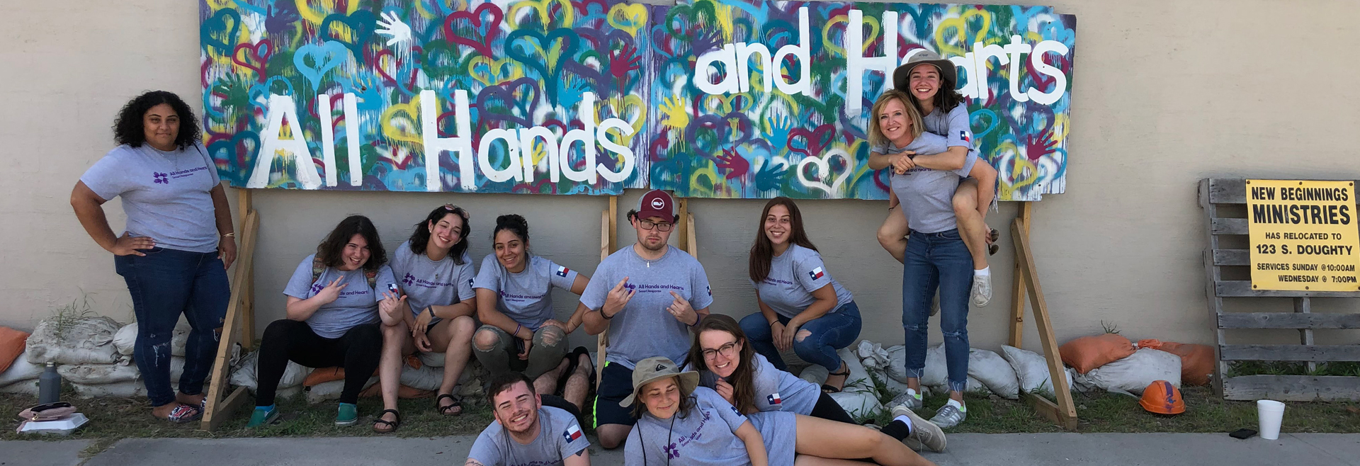 IDMH's Director, Amy Nitza (pictured right standing), with the other SUNY students who travelled to Coastal Bend, Texas to assist All Hands and Hearts in repairing homes which still require repair after Hurricane Harvey hit the region in 2017.