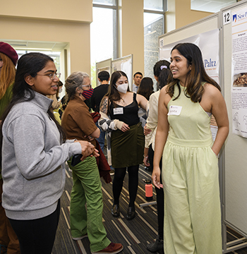 Students talking at the Student Research Symposium