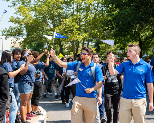 Incoming First Year students walking through hallway