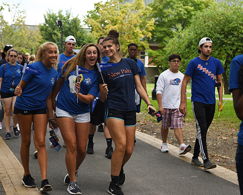 students walking to to Convocation Ceremony