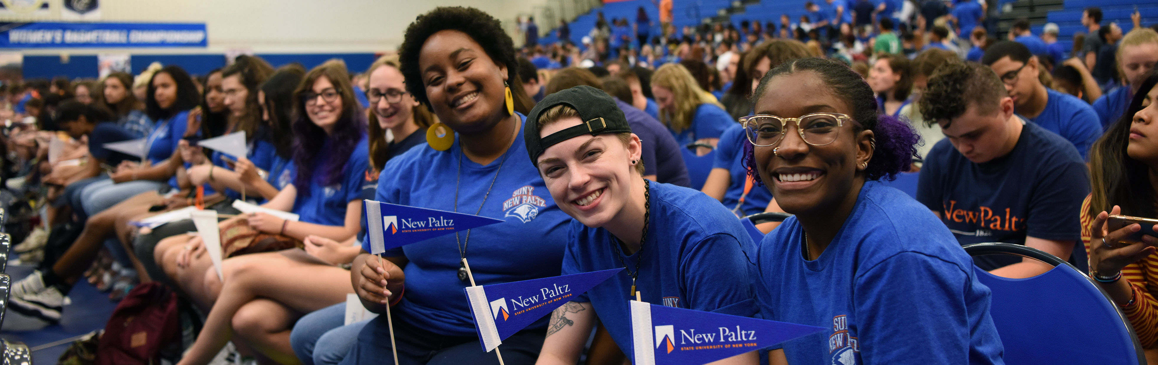 students smiling while attending 2019 Convocation
