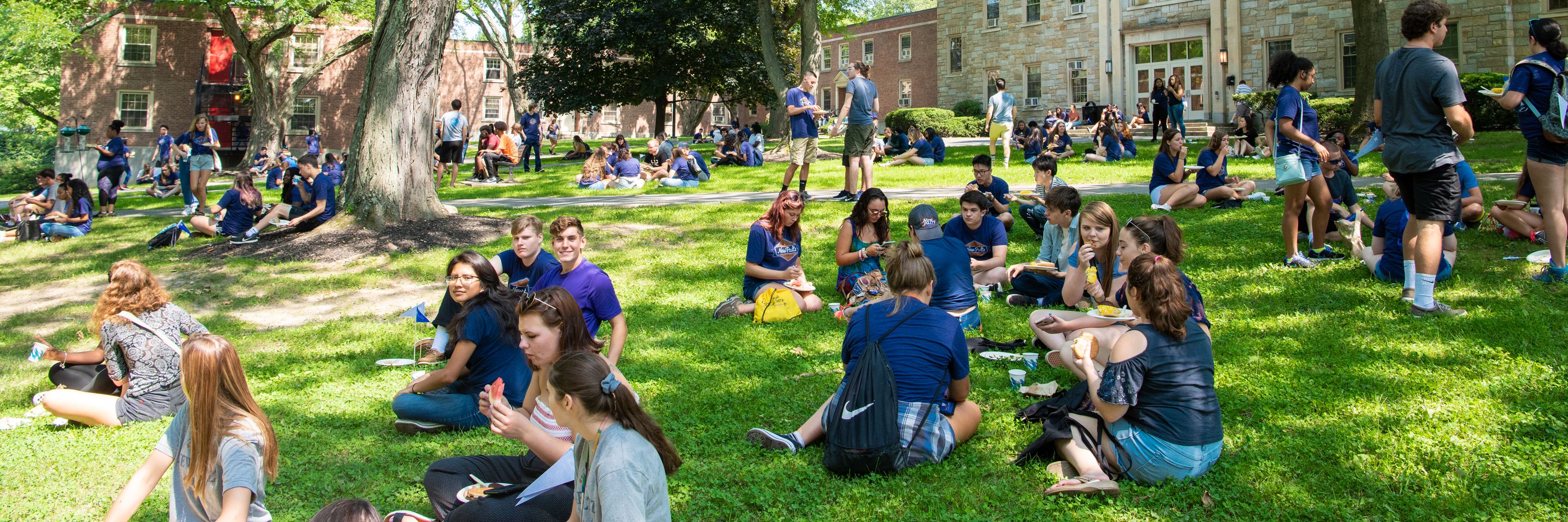 Students enjoying a BBQ in the quad