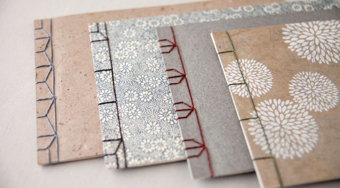 handmade books with sewn bindings displayed