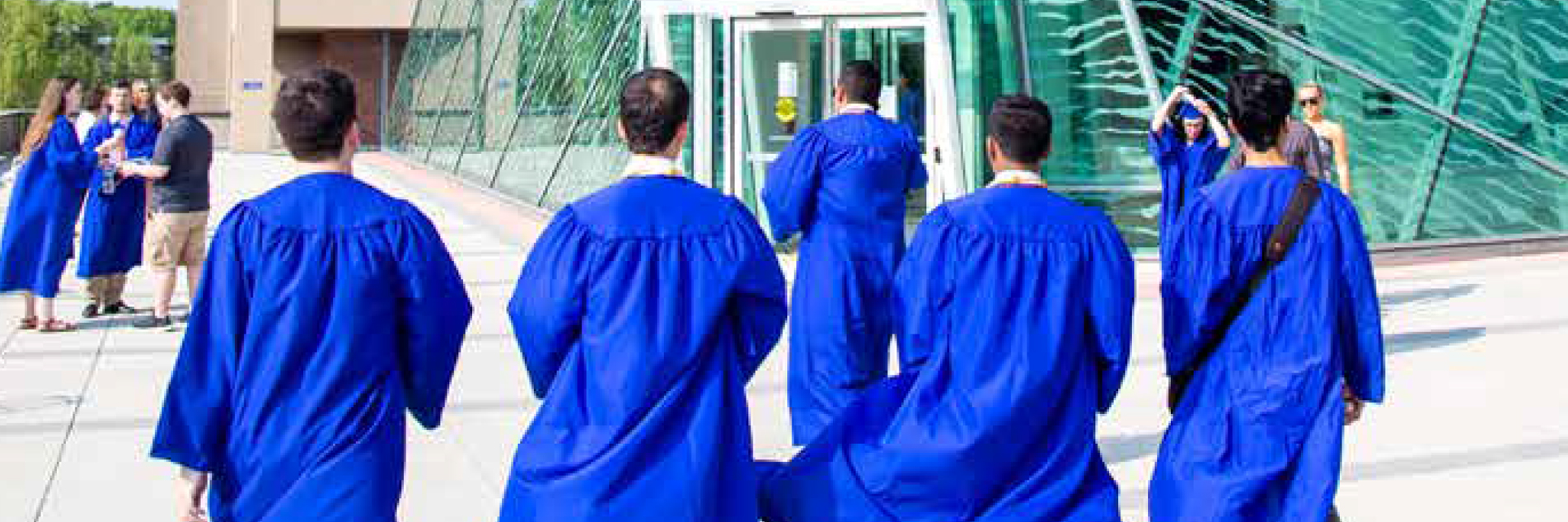 Crossing the finish line - graduating students walking into the Atrium