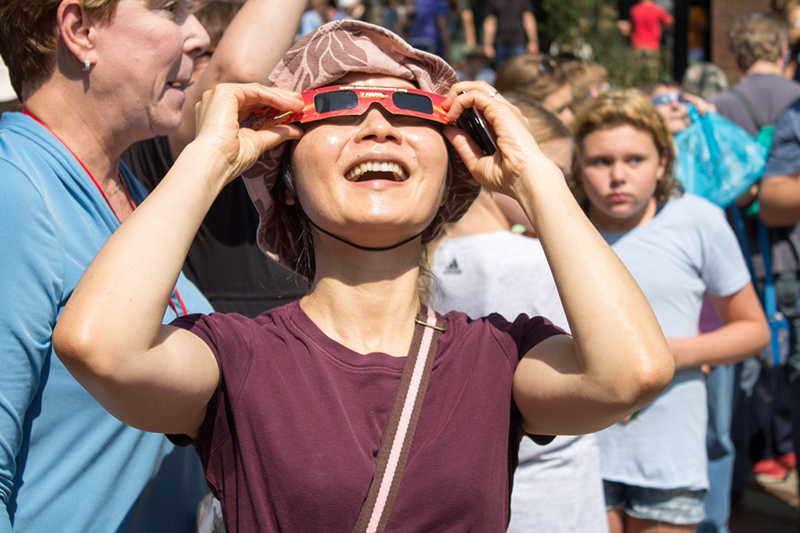 Woman looking through special glasses