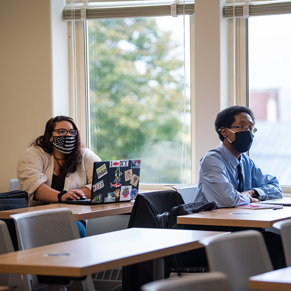 masked students in class