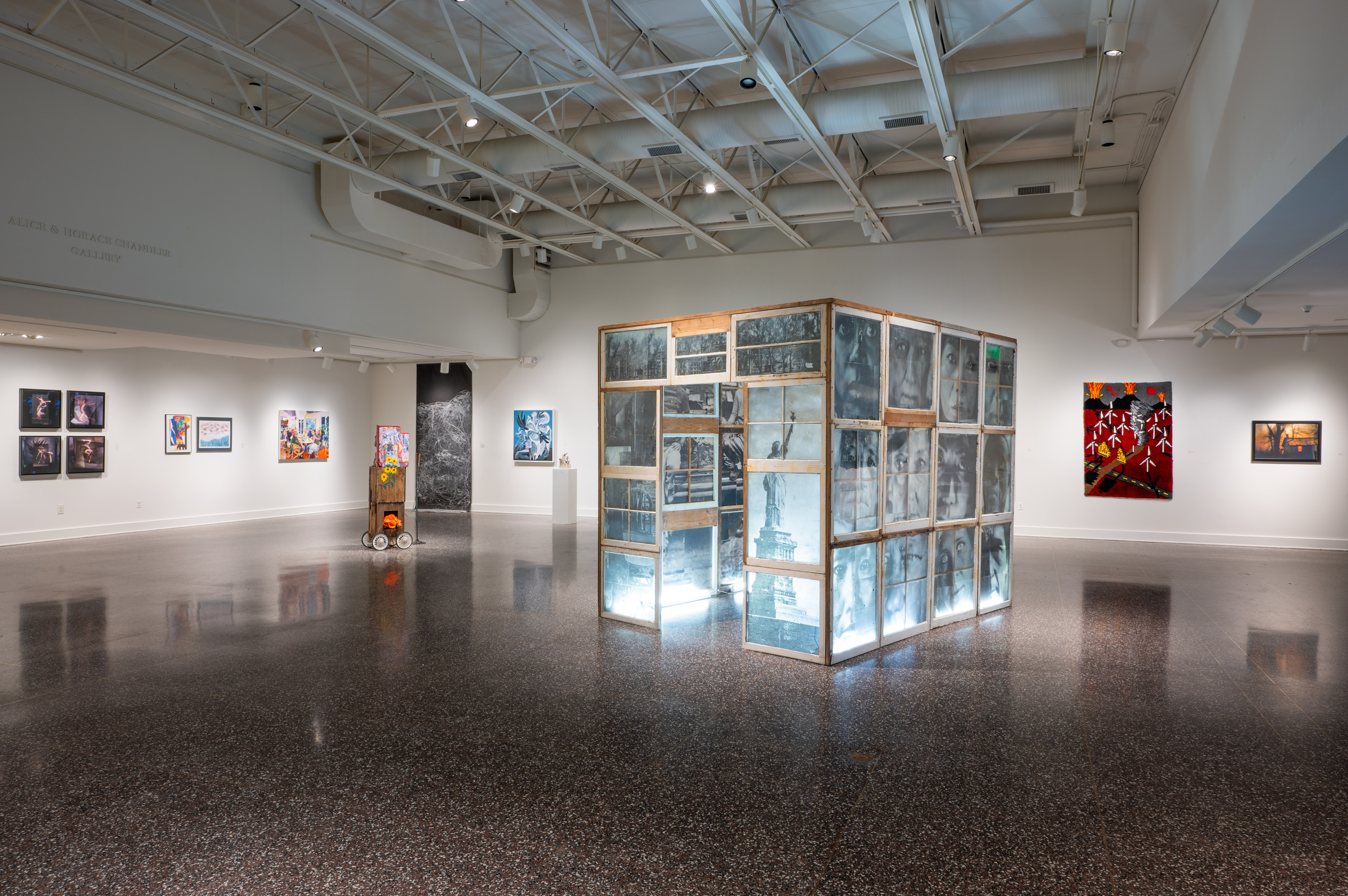 Wide gallery view of Hudson Valley Artists: 2025 at the Dorsky Museum, showing diverse works on walls and in open space.
