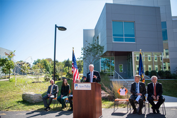 Don Christian speaking to the audience at the Ribbon Cutting Ceremony