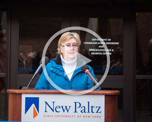 Director Jana Losey speaking at the ribbon cutting ceremony