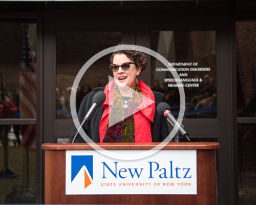 Stella Turk speaking at the ribbon cutting ceremony