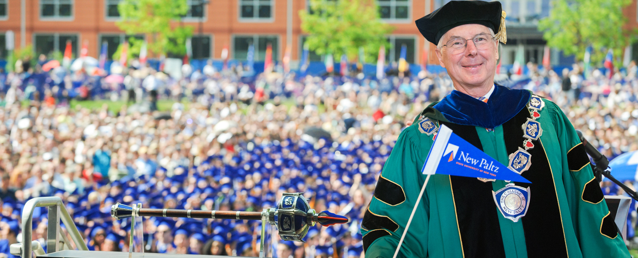 President Christian on stage at Commencement Ceremony