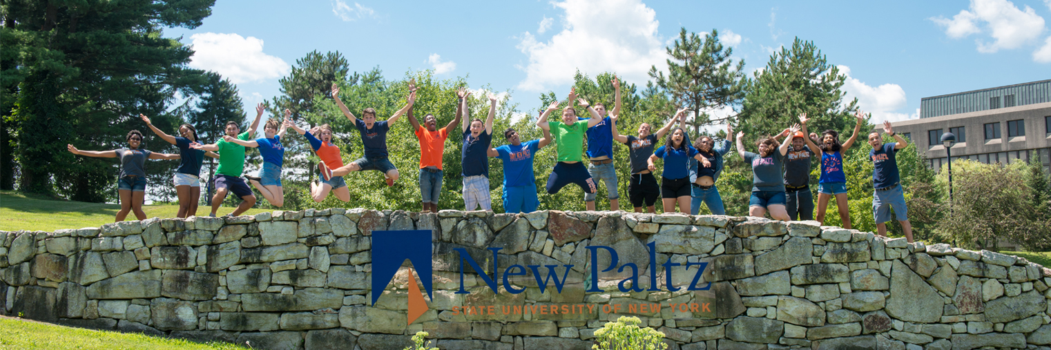 students jumping off wall 